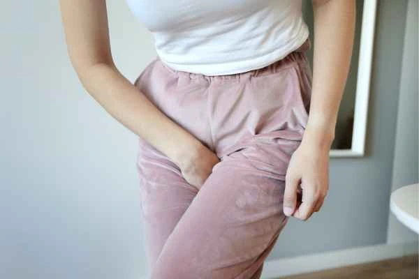 woman struggling with urine incontinence Cheltenham