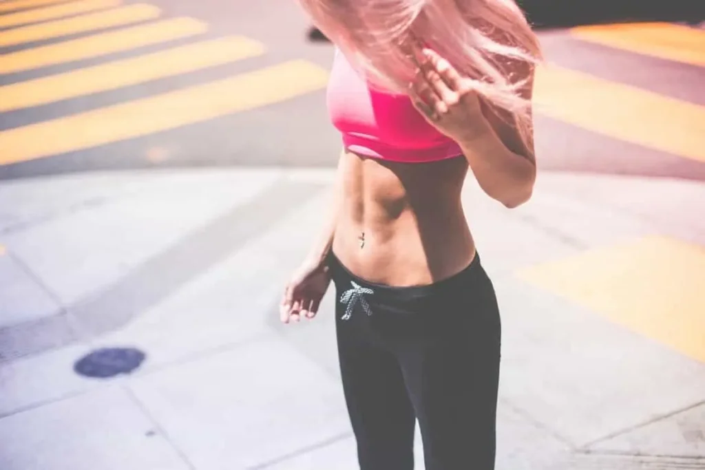 Woman with toned stomach after LA-EMS Body Sculpting Treatment Cheltenham